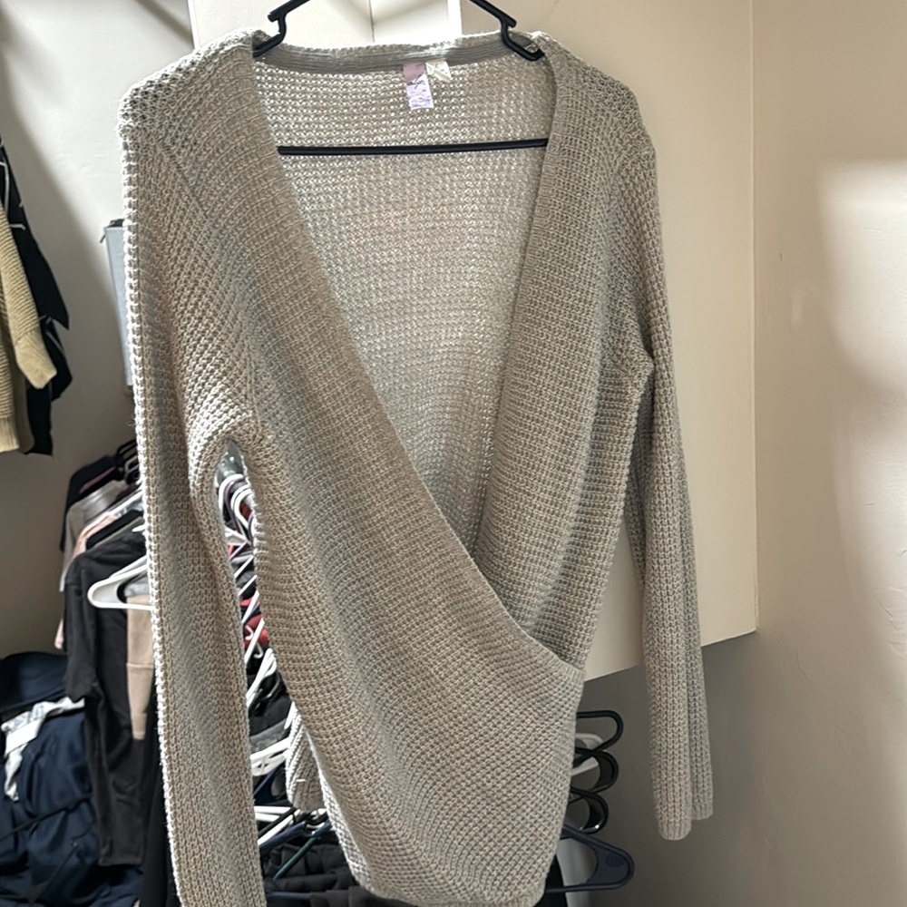 Grey crossbody sweater size L.